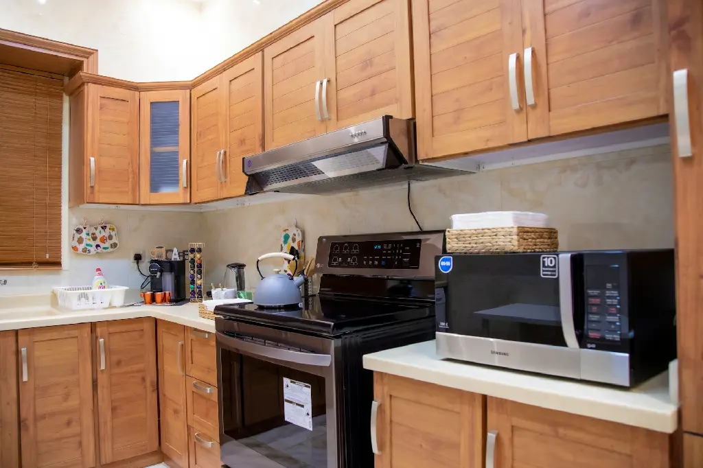 unsplash_aNxVZkqr8kw_wooden kitchen cabinet.webp
